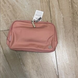 Lululemon 2L Everywhere Belt Bag price tag removed, description tag attached